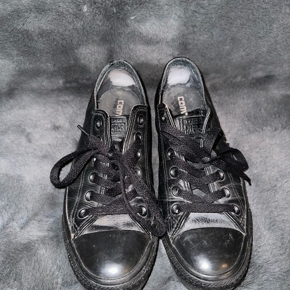 Worn down leather chucks